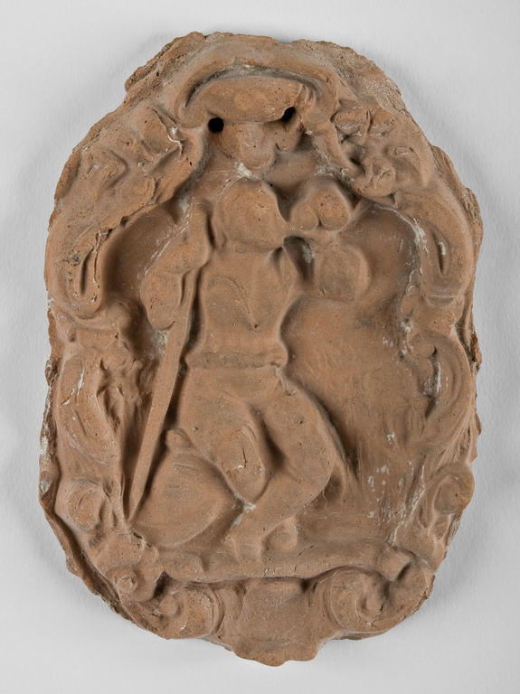 Formella in terracotta con figura maschile