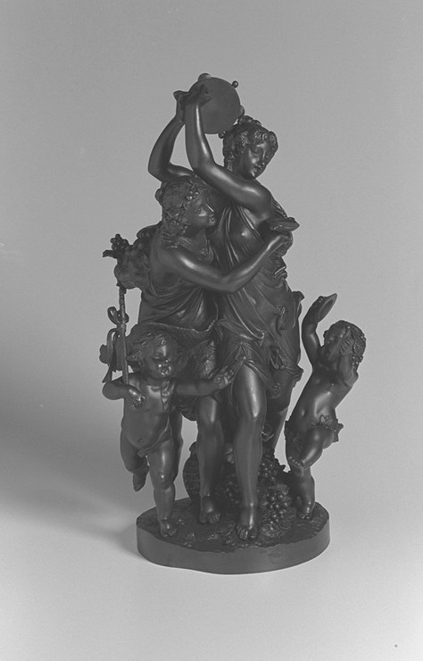 Statua in bronzo con baccanale