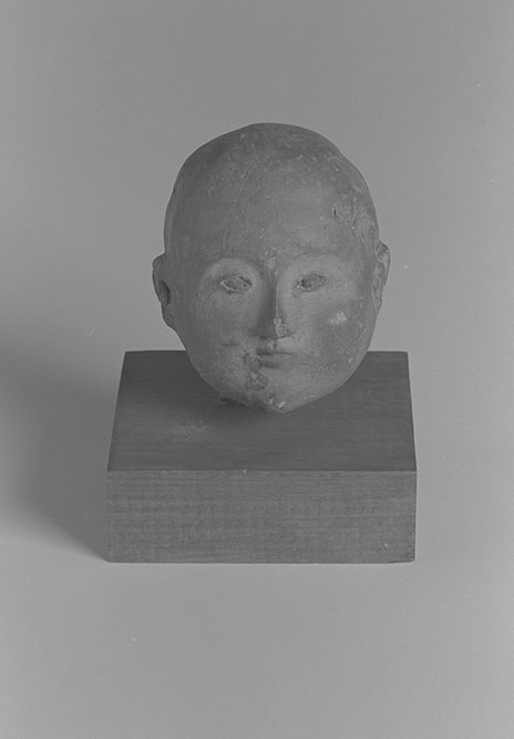 Testa di fanciullo in terracotta